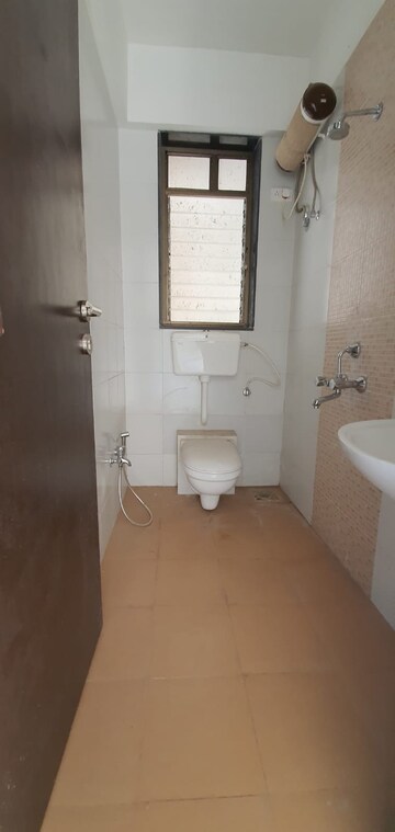 Bathroom in 1 BHK Apartment at Rohan Mirage, Matunga West – for Rent