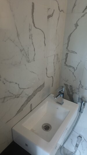 Bathroom in 2 BHK Apartment at Hubtown Palmrose, Andheri East – for Sale