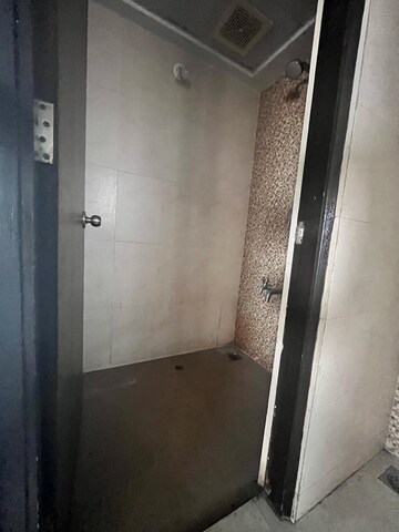 Bathroom in 1 BHK Apartment at Lodha Palava City Lakeshore Greens, Dombivli East – for Rent