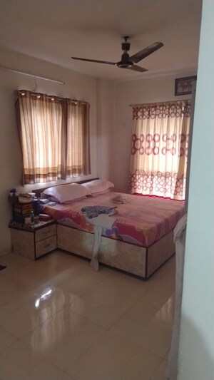 Bedroom in 2 BHK Apartment at Dorabjee Enclave, Salunkhe Vihar Society – for Sale