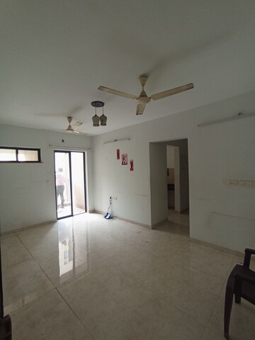 Living Room in 2 BHK Apartment at Lodha Palava City Lakeshore Greens, Dombivli East – for Sale