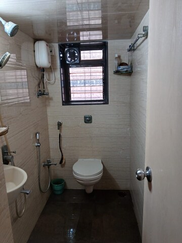 Bathroom in 2 BHK Apartment at Milap CHS, Andheri West – for Rent