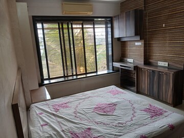 Bedroom in 2 BHK Apartment at Milap CHS, Andheri West – for Rent
