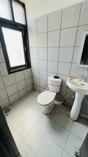 Bathroom in Studio Apartment at Maya Garden City, Lohgarh – for Rent
