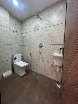 Bathroom in 4 BHK Builder Floor at Dwarka Mor – for Sale