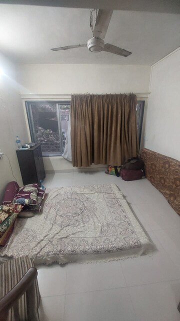 Bedroom in 2 BHK Apartment at Satellite Garden, Goregaon East – for Rent