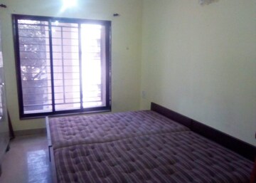 Master Bedroom in 2 BHK Apartment at Sadguru Towers, Goregaon East – for Sale