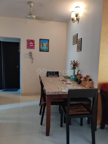 Living Room in 2 BHK Apartment at Kesar Gardens, Kharghar – for Sale
