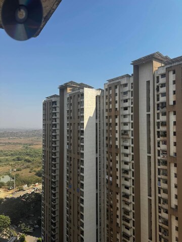 Living Room in 1 BHK Apartment at Raunak Bliss, Ghodbunder Road – for Rent