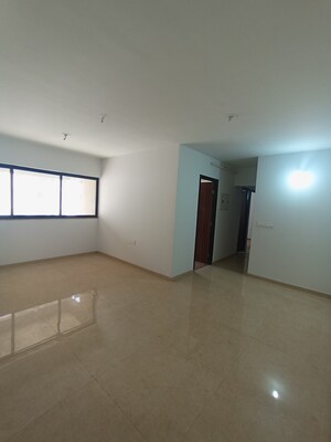 Living Room in 2 BHK Apartment at Lodha Palava City Lakeshore Greens, Dombivli East – for Sale