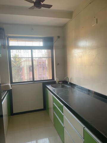 Kitchen in 1 RK Apartment at Saraf Choudhari Nagar CHS, Kandivali East – for Rent