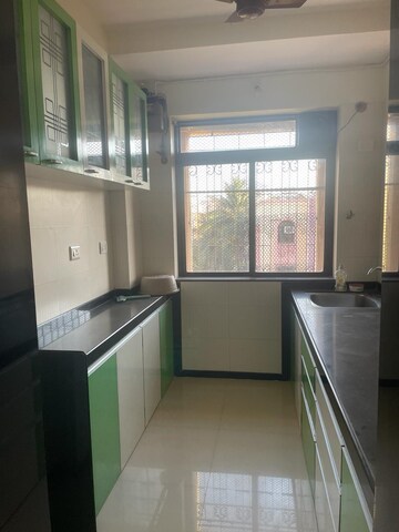 Kitchen in 1 RK Apartment at Saraf Choudhari Nagar CHS, Kandivali East – for Rent