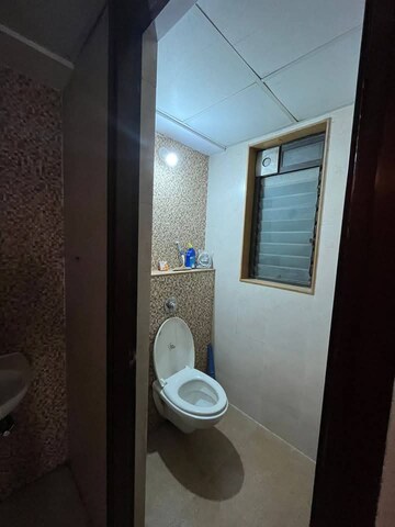 Bathroom in 1 BHK Apartment at Lodha Lakeshore Greens, Dombivli East – for Rent