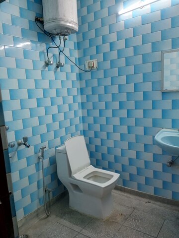 Bathroom in 3 BHK Builder Floor at Palam Vihar Residents Association, Palam Vihar – for Rent