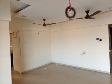 Living Room in 2 BHK Apartment at Galaxy Carina, Kharghar – for Sale