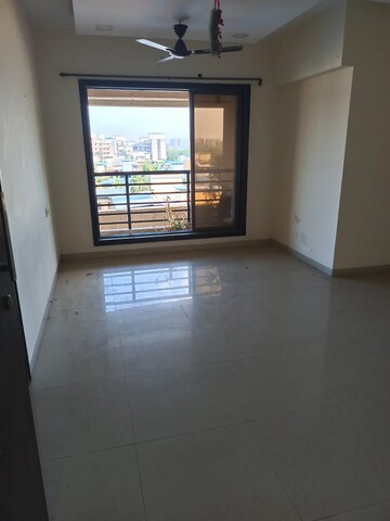 Living Room in 2 BHK Apartment at Galaxy Carina, Kharghar – for Sale