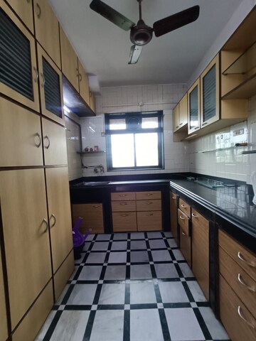 Kitchen in 3 BHK Apartment at Raj Park CHS, Kalwa – for Sale
