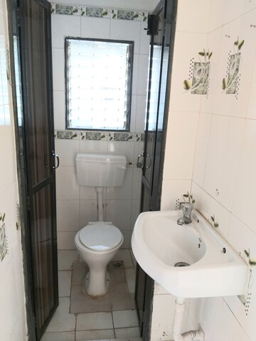Bathroom in 1 BHK Apartment at Nandini CHS Vasai, Vasai West – for Sale