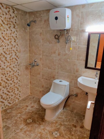 Bathroom in Studio Apartment at Supertech Czar Suites, Omicron I Greater Noida – for Rent