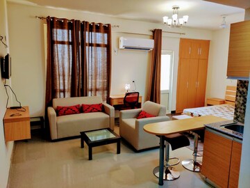 Building Lobby in Studio Apartment at Supertech Czar Suites, Omicron I Greater Noida – for Rent