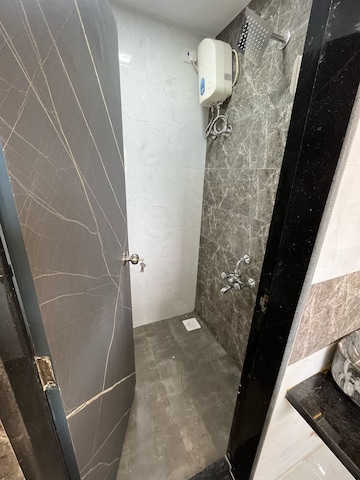 Bathroom in 1 BHK Apartment at Marwadi Wadi Tower, Parel – for Rent