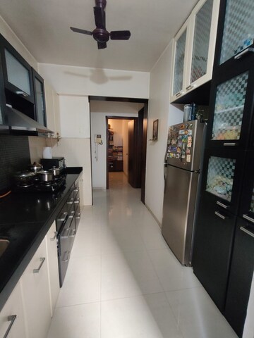 Kitchen in 2.5 BHK Apartment at Shree Satya Shankar Residency, Manpada – for Sale