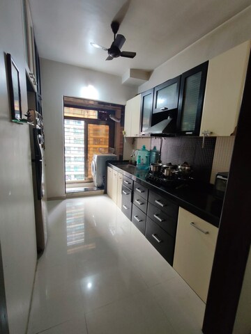 Kitchen in 2.5 BHK Apartment at Shree Satya Shankar Residency, Manpada – for Sale