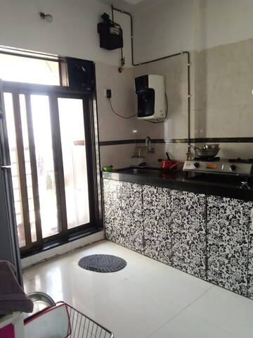 Kitchen in 2 BHK Apartment at Swaraj Bella Vista, Ghansoli – for Rent