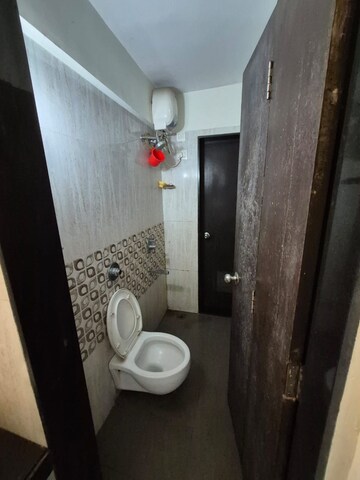 Bathroom in 1 BHK Apartment at The Baya Goldspot, Andheri East – for Sale