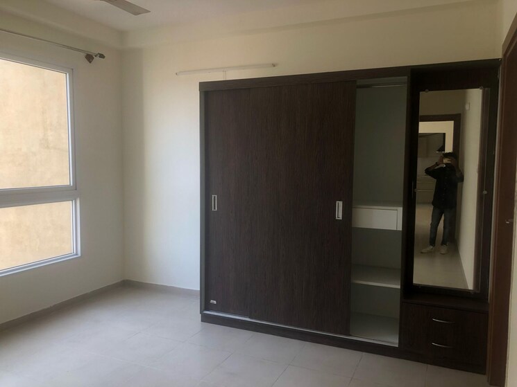 Master Bedroom, bhartiya-nikoo-homes 2 Bedroom 1050 Sq.Ft. Apartment In Thanisandra Main Road Bangalore 8458411