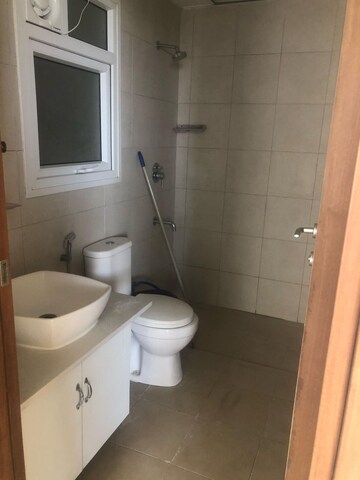 Bathroom in 2 BHK Apartment at Bhartiya Nikoo Homes, Thanisandra Main Road – for Rent