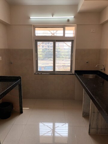 Kitchen in 1 BHK Apartment at Charms Global City, Ambernath East – for Sale