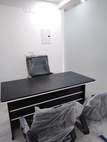 Bedroom in 1.5 BHK Apartment at Paradigm Business Hermitage Park, Dhakoli Village – for Rent