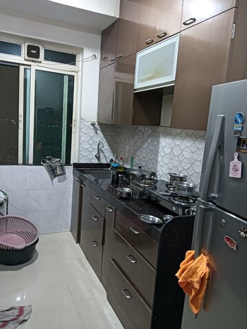Kitchen in 2 BHK Apartment at Rustomjee Athena, Majiwada – for Sale