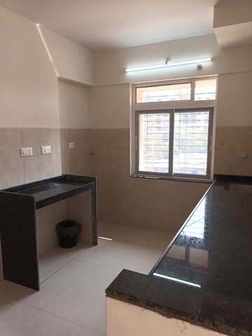 Kitchen in 2 BHK Apartment at Charms Global City, Ambernath East – for Sale