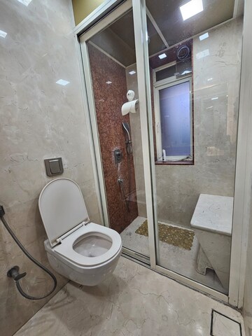 Bathroom in 3 BHK Apartment at Rustomjee OZone, Goregaon West – for Rent