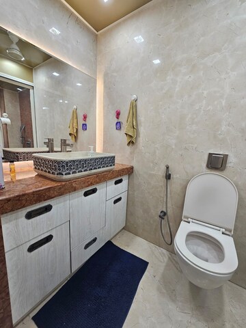 Bathroom in 3 BHK Apartment at Rustomjee OZone, Goregaon West – for Rent