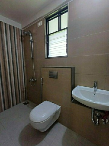 Bathroom in 2.5 BHK Apartment at Magarpatta Riverview City Hornbill Heights, Loni Kalbhor – for Sale