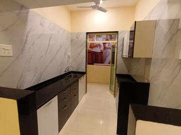Kitchen in 2 BHK Apartment at Mohan Precious Greens, Ambernath – for Sale