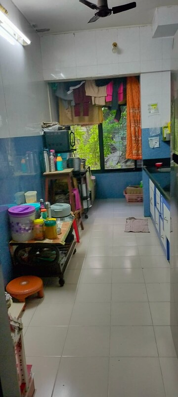 Kitchen in 1 BHK Apartment at Neelam Nagar CHS, Mulund East – for Sale