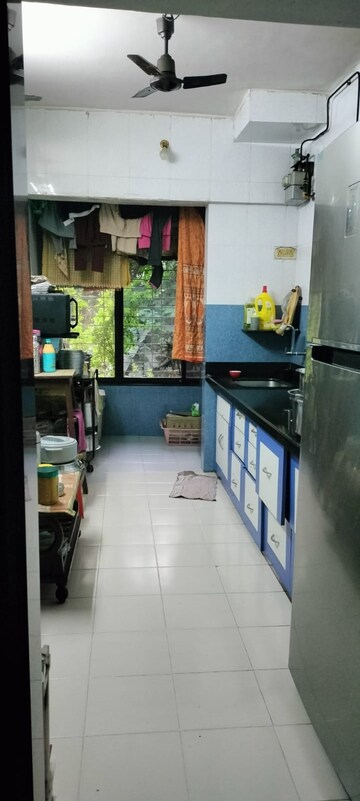 Kitchen in 1 BHK Apartment at Neelam Nagar CHS, Mulund East – for Sale