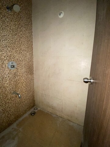 Bathroom in 1 BHK Apartment at Lodha Palava City Lakeshore Greens, Dombivli East – for Rent