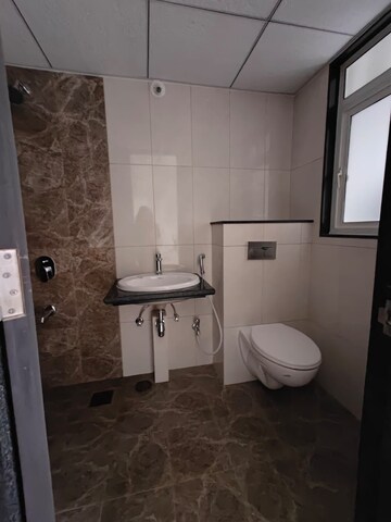 Bathroom in 1 BHK Apartment at Kolte Patil Life Republic, Hinjewadi – for Rent