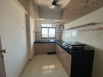 Kitchen in 2 BHK Apartment at Lokhandwala Harmony, Worli – for Rent