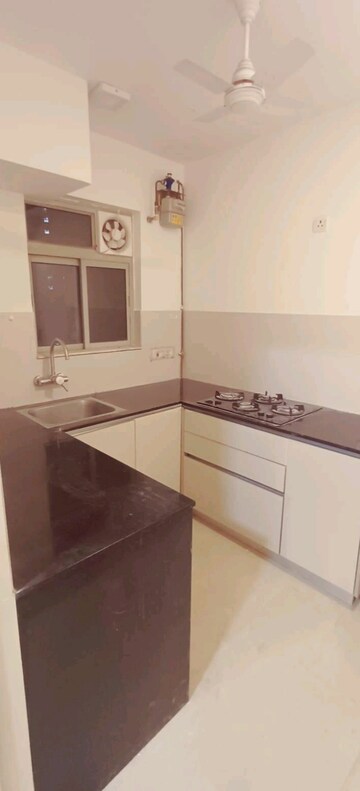Kitchen in 1.5 BHK Apartment at Hiranandani Lavinia, Ghodbunder Road – for Rent