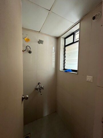 Bathroom in 1 BHK Apartment at Lodha Golden Dream, Dombivli East – for Rent