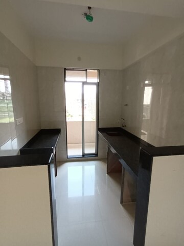 Kitchen in 2 BHK Apartment at Nisarg Greens, Ambernath East – for Sale