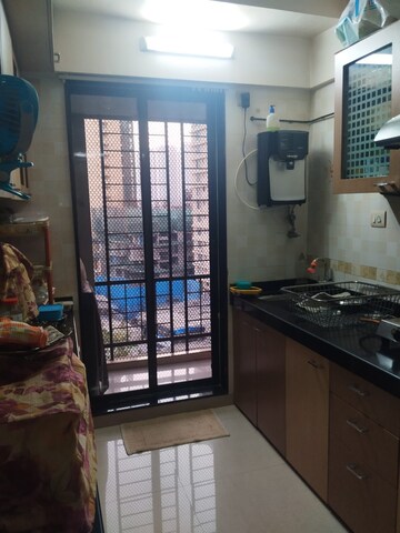 Kitchen in 2 BHK Apartment at Riddhi Tower, Malad East – for Rent
