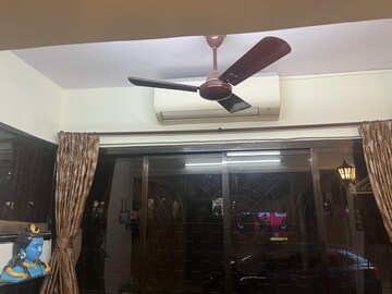 Living Room in 1 BHK Apartment at Self Help CHS, Vile Parle West – for Rent