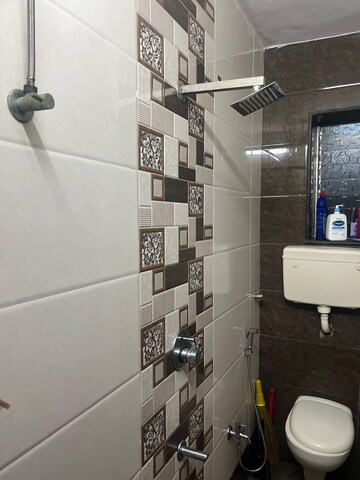 Bathroom in 1 BHK Apartment at Self Help CHS, Vile Parle West – for Rent